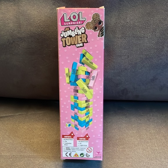 Jumbling tower game.  48 wood pieces.  Ages 5+.​ - Picture 2 of 3